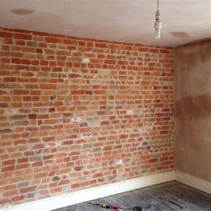 How do you finish exposed brick wall