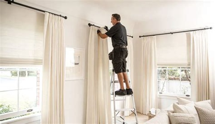 How do you install a drapery rod set