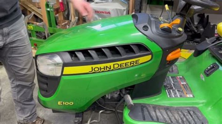 How much does a John Deere e100 weight